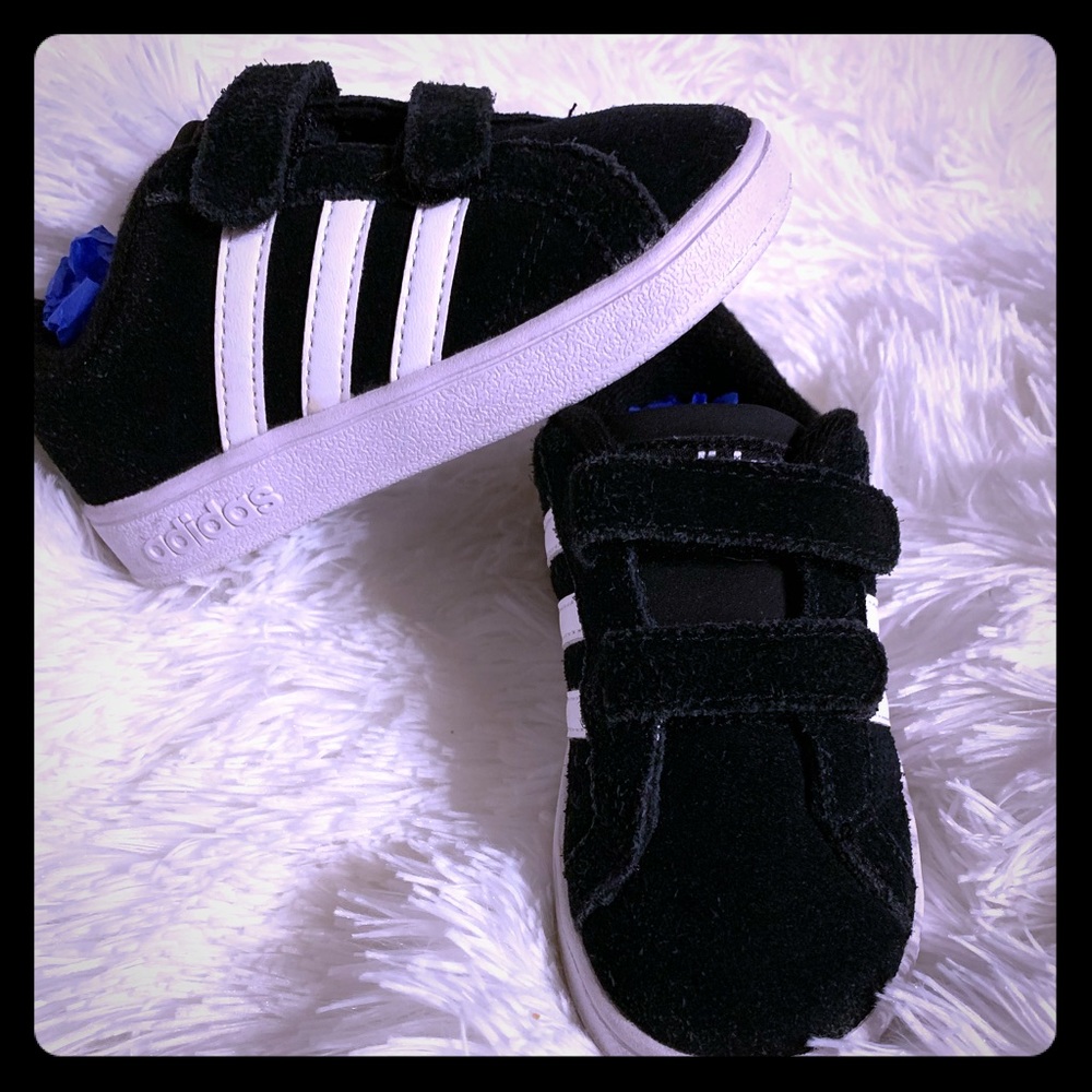 Black Adidas sneakers
